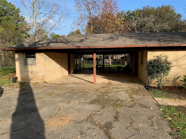 view of parking featuring a carport