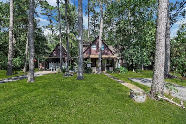 view of front of home with a porch and a front lawn