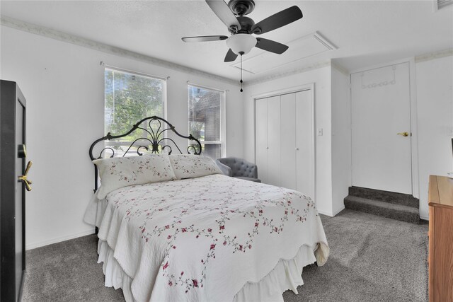 carpeted bedroom featuring a closet and ceiling fan