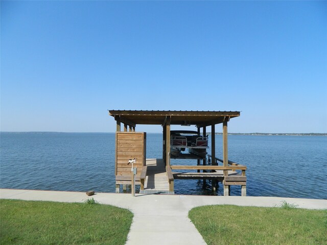 dock area featuring a water view