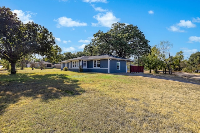 exterior space featuring a front lawn