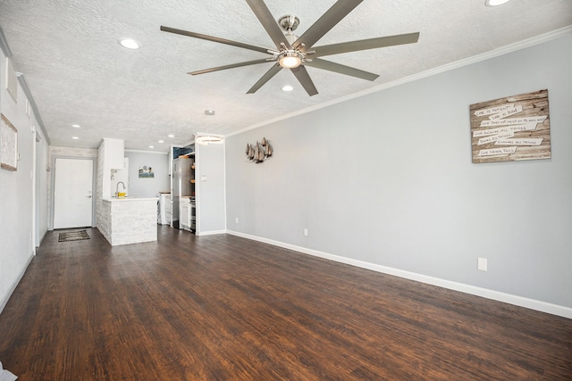 unfurnished living room featuring ornamental molding, dark hardwood / wood-style flooring, and a textured ceiling