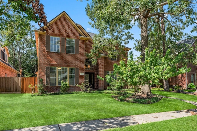 view of front property with a front lawn