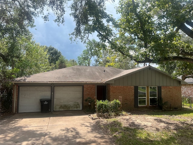 single story home with a garage