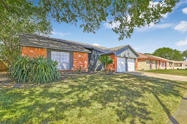 single story home with a front yard and a garage