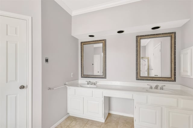 bathroom with crown molding, tile patterned floors, and vanity