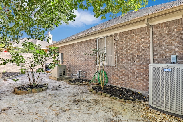 view of property exterior featuring central AC unit