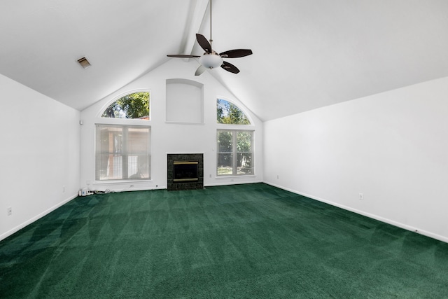 unfurnished living room featuring beam ceiling, dark colored carpet, high vaulted ceiling, and ceiling fan