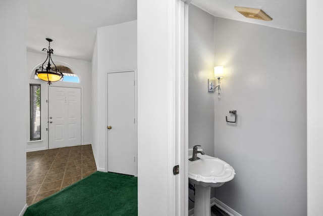 bathroom with tile patterned flooring