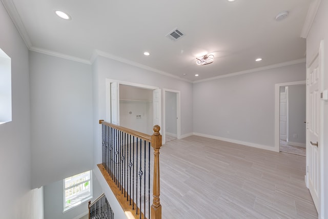 hallway with crown molding