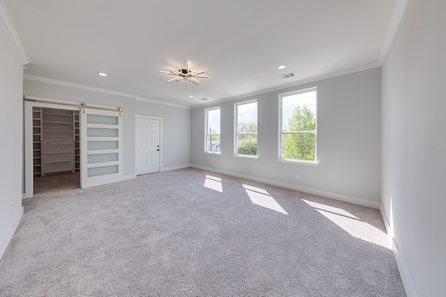 unfurnished bedroom with light colored carpet and ornamental molding