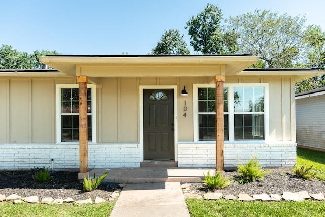 property entrance with a porch