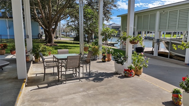 view of patio / terrace with a water view