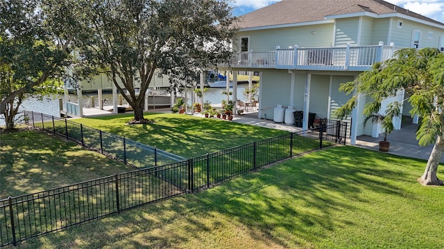 exterior space featuring a water view and a patio area