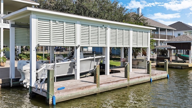 dock area featuring a water view