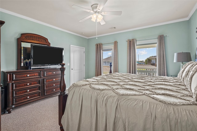 carpeted bedroom featuring ornamental molding and ceiling fan