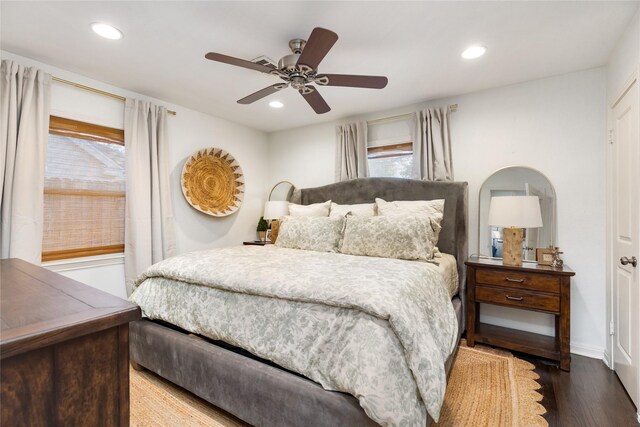 bedroom with ceiling fan and hardwood / wood-style floors