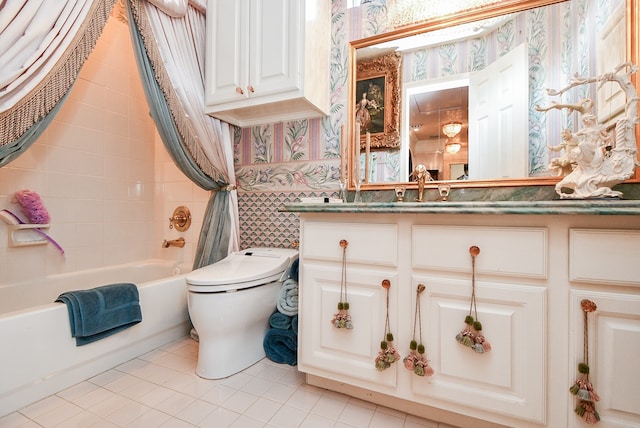 full bathroom with shower / tub combo with curtain, tile patterned floors, vanity, and toilet