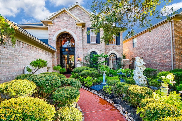 property entrance featuring french doors