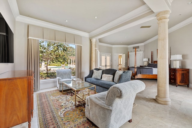 living room with decorative columns and ornamental molding