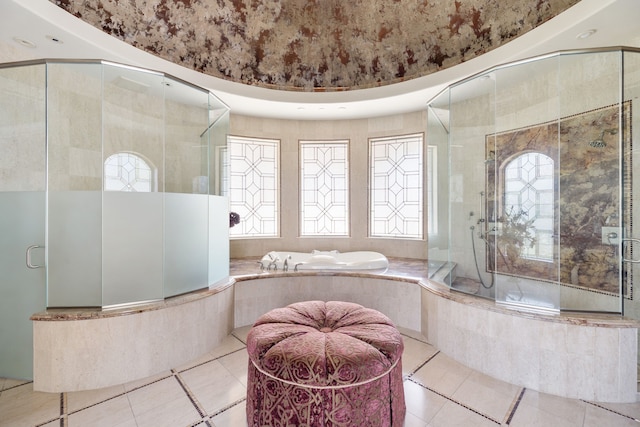 bathroom featuring tile patterned flooring and a shower with shower door