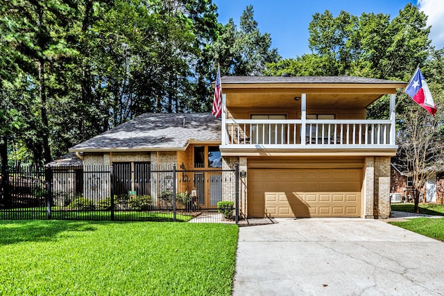 view of front of home with a garage and a front yard