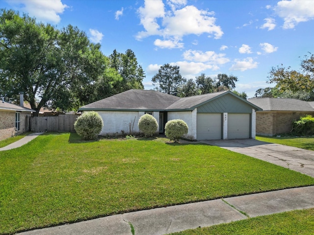 ranch-style house with a front yard and a garage