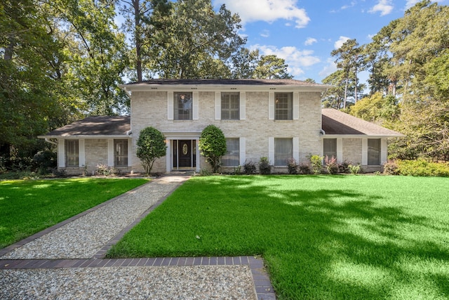 view of front facade with a front lawn