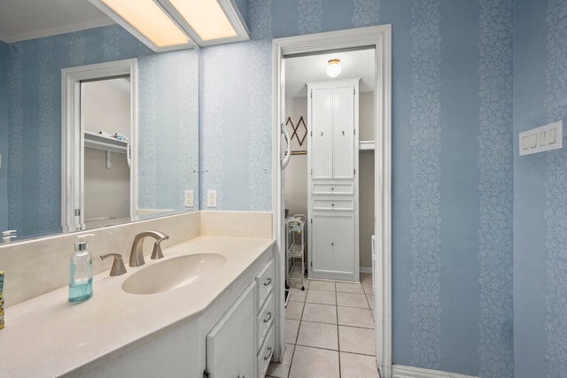 bathroom featuring tile patterned floors and vanity