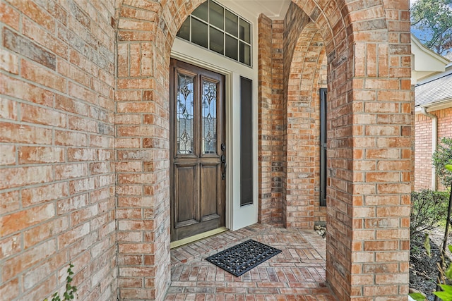 doorway to property featuring a porch