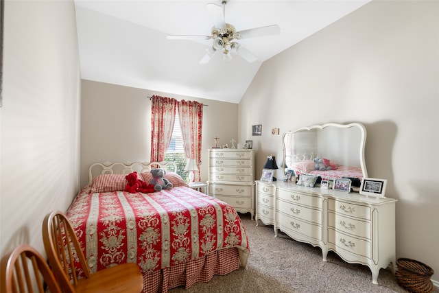 bedroom featuring lofted ceiling, ceiling fan, and carpet