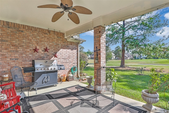 view of patio / terrace featuring area for grilling and ceiling fan