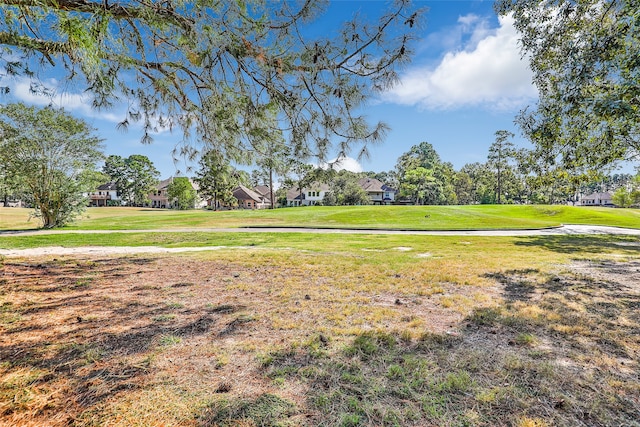 surrounding community with a lawn