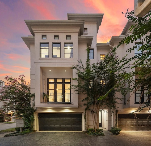 view of front of home with a garage