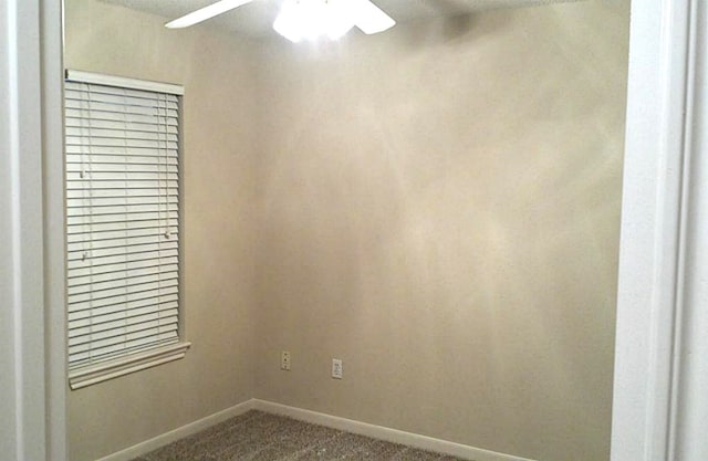 unfurnished room featuring ceiling fan