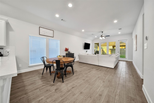 dining area featuring ceiling fan and light hardwood / wood-style floors