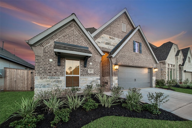 view of front of property with a garage