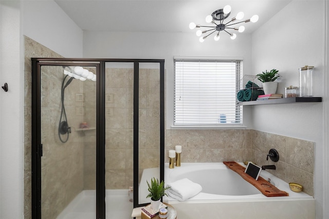 226 Hampton Glen Rd, Montgomery, TX 77356 - bathroom featuring a bath, a chandelier, and a stall shower
