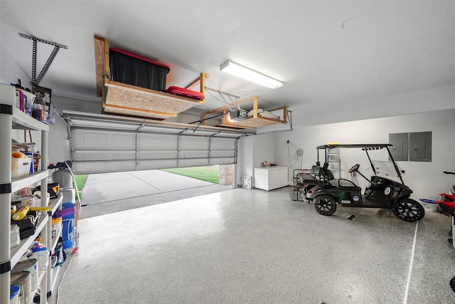 226 Hampton Glen Rd, Montgomery, TX 77356 - garage with a garage door opener and electric panel