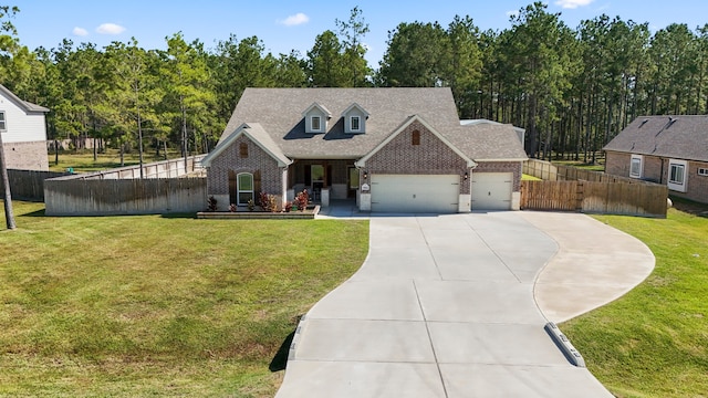 view of front facade with a front yard and a garage