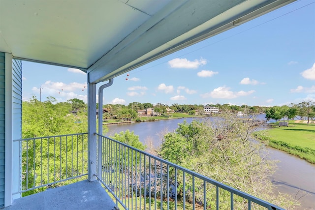 balcony featuring a water view