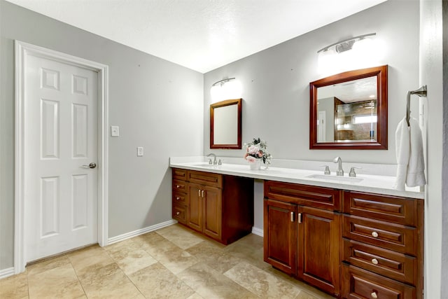 bathroom featuring vanity and a textured ceiling