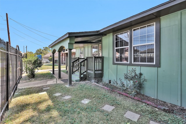 view of side of property with fence