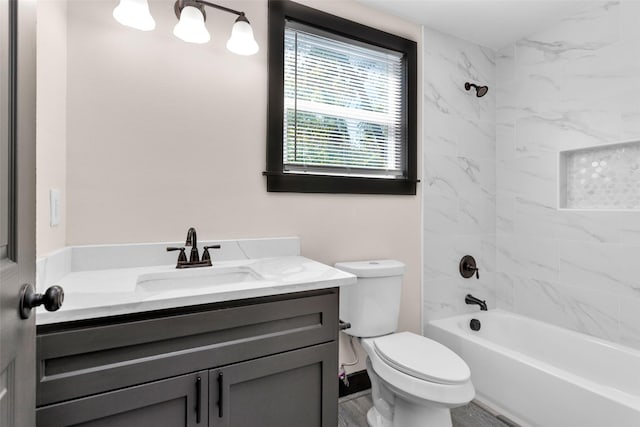 full bathroom with toilet, vanity, and shower / tub combination
