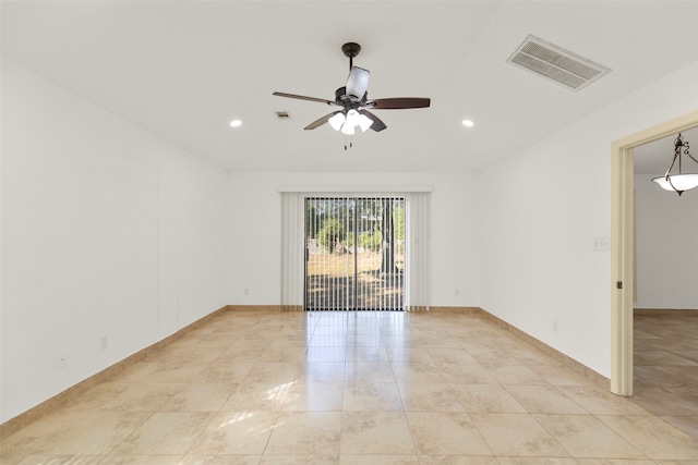 unfurnished room with ceiling fan