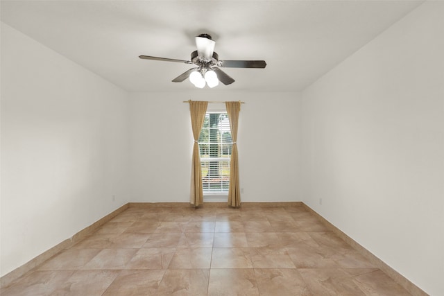 unfurnished room featuring ceiling fan