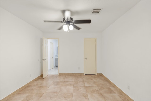 unfurnished room with ceiling fan