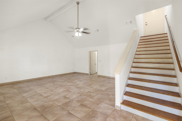 staircase featuring beam ceiling, high vaulted ceiling, and ceiling fan