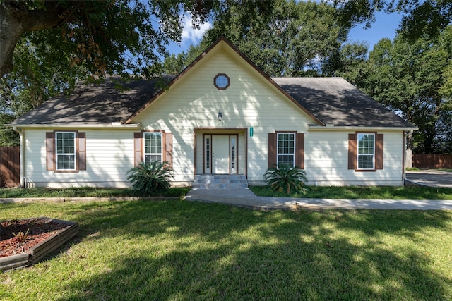 view of front of property with a front lawn