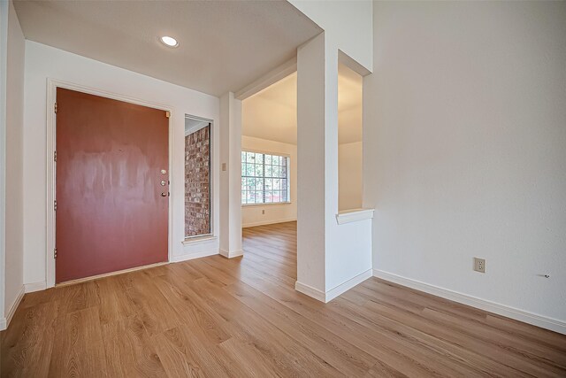 2810 Pineleaf Dr, Sugar Land, TX 77479 - entryway with light wood-style flooring, baseboards, and recessed lighting
